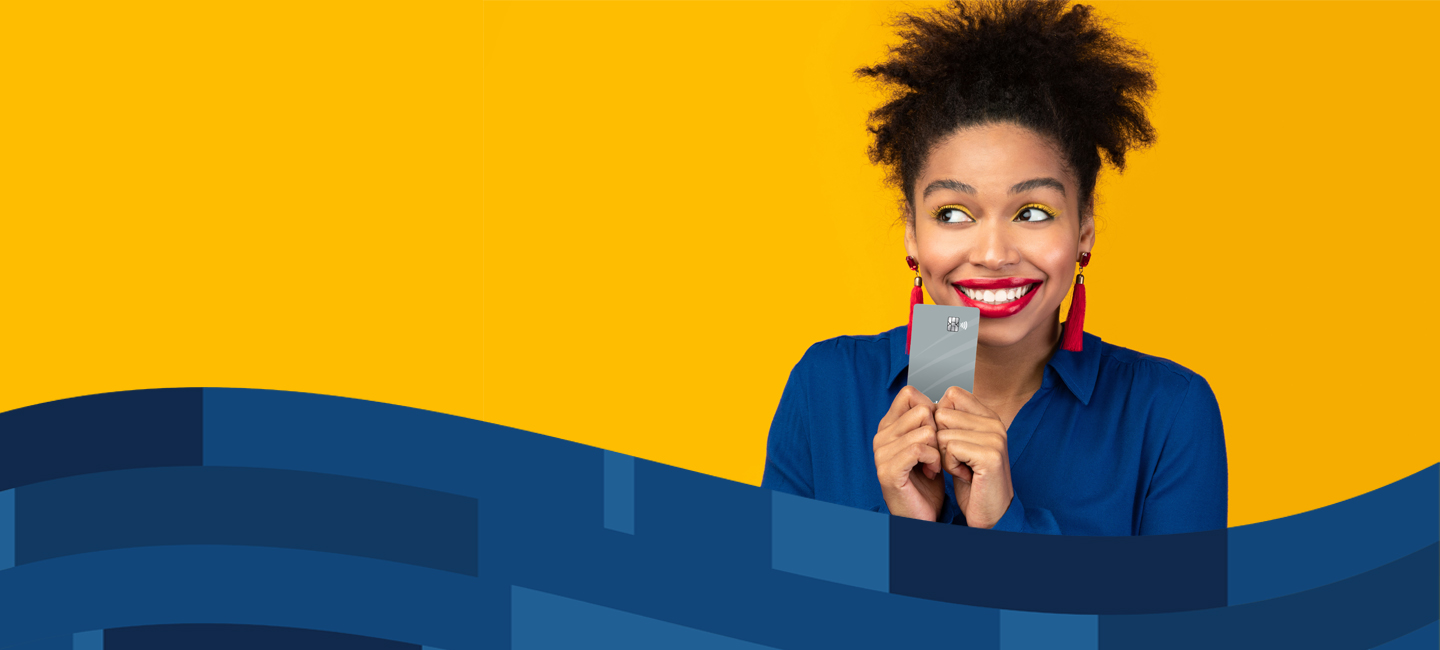 Woman holding a Visa Platinum Rewards Card